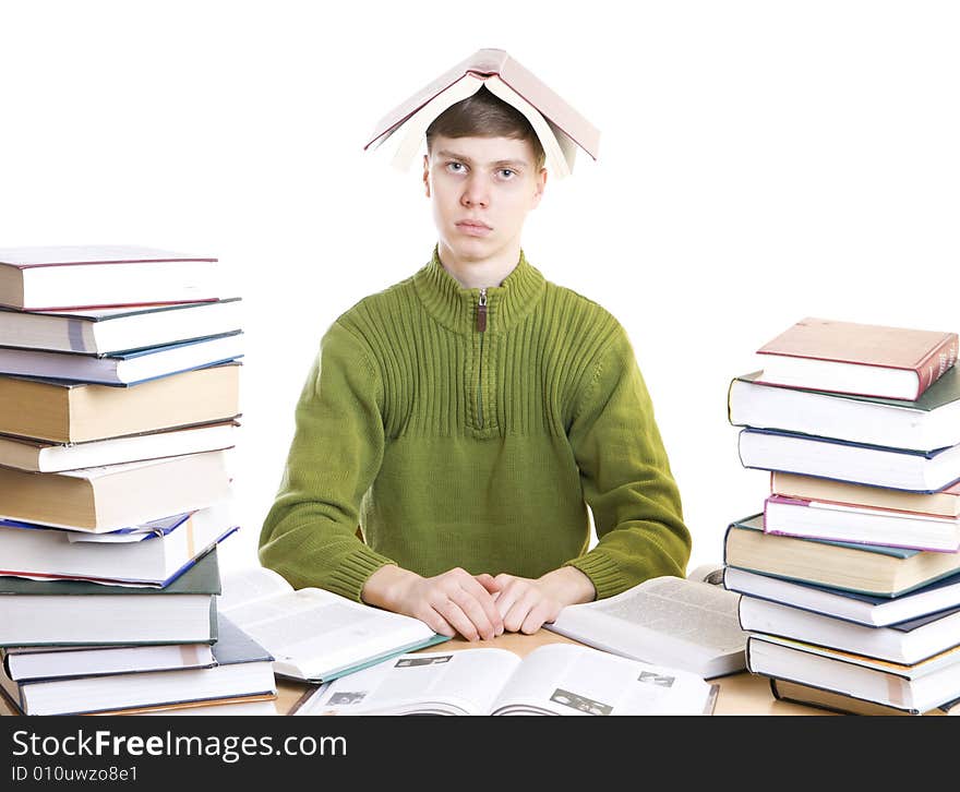 The young student with books isolated on a white