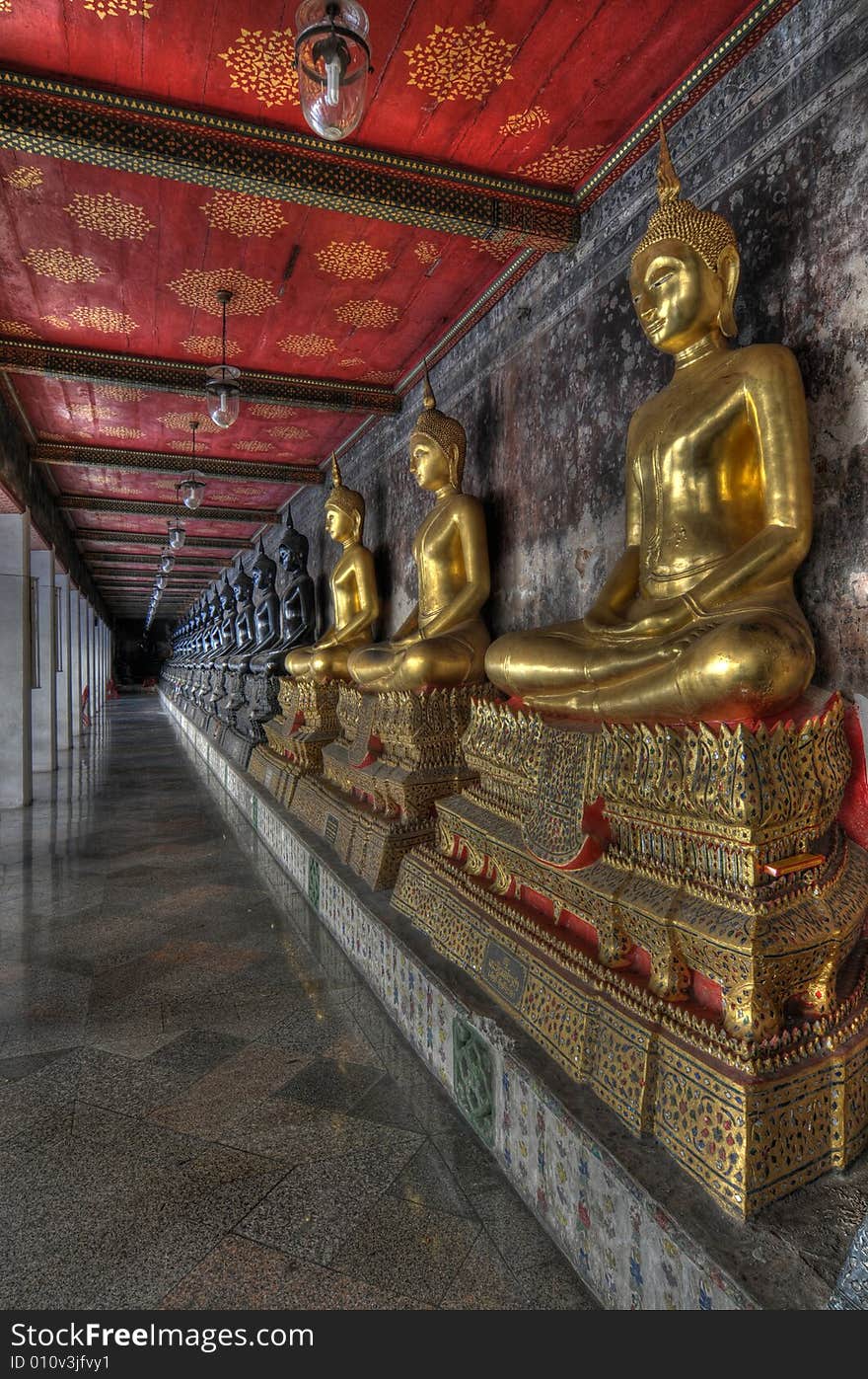 This is a HDR capture of the colonnade around the Viharn at Wat Suthat in Bangkok.