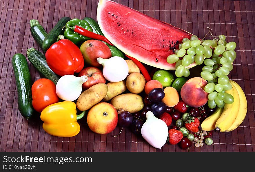 Vegetables and Fruits on brown background