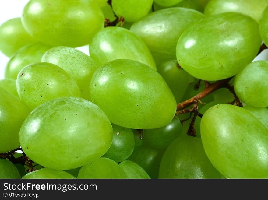 Green grapes isolated on white background