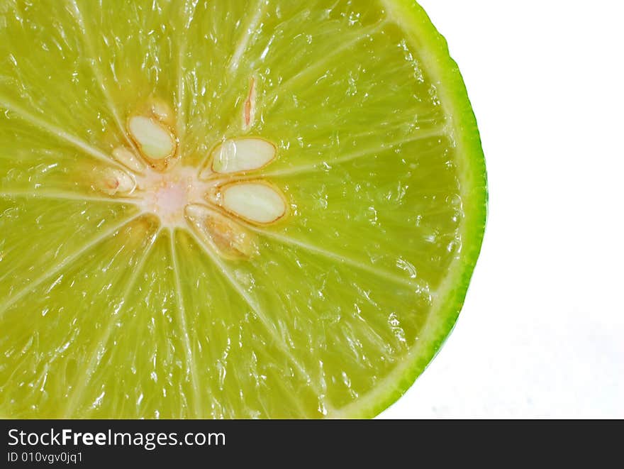 A close up of a cut lime. A close up of a cut lime.