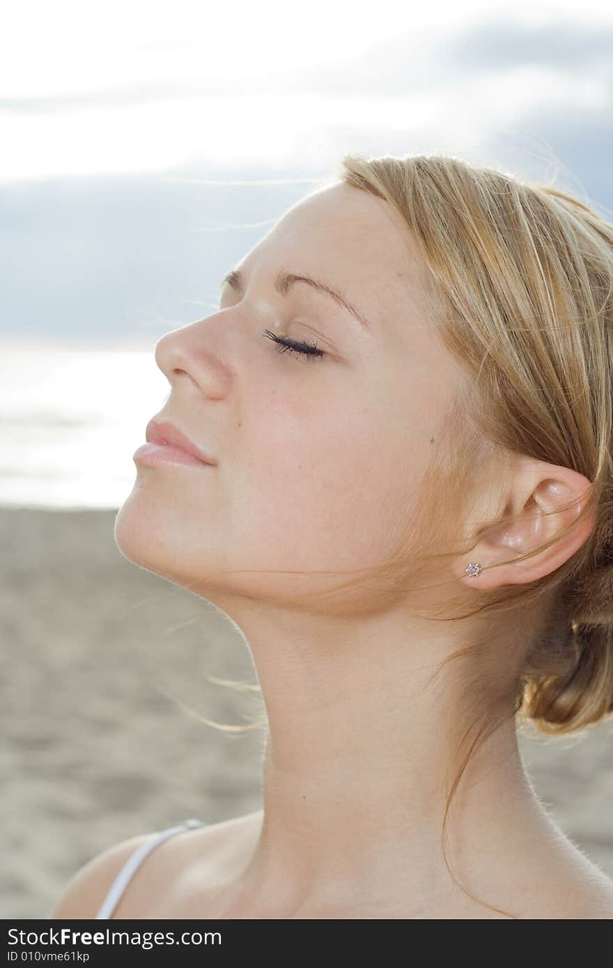 Beautiful woman relaxing on the beach. Beautiful woman relaxing on the beach.