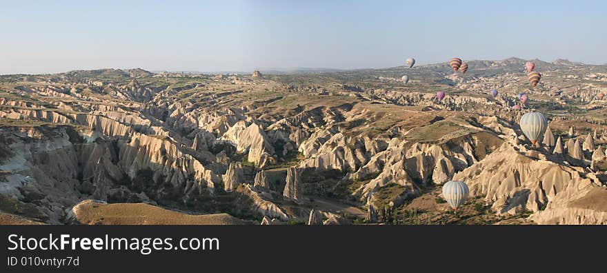 Hot air balloons over cappadocia at sunrise