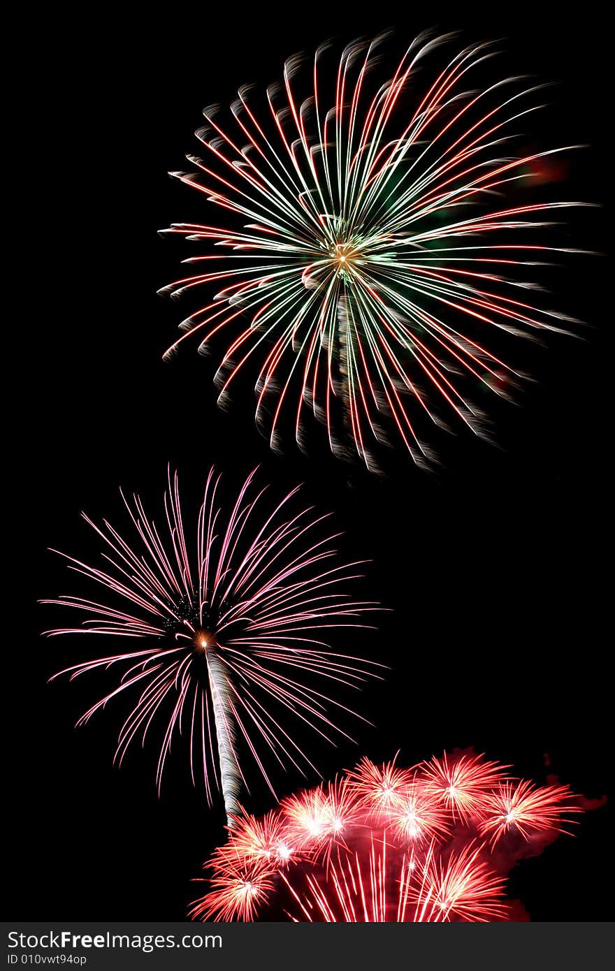 Some Colorful fireworks against a black sky