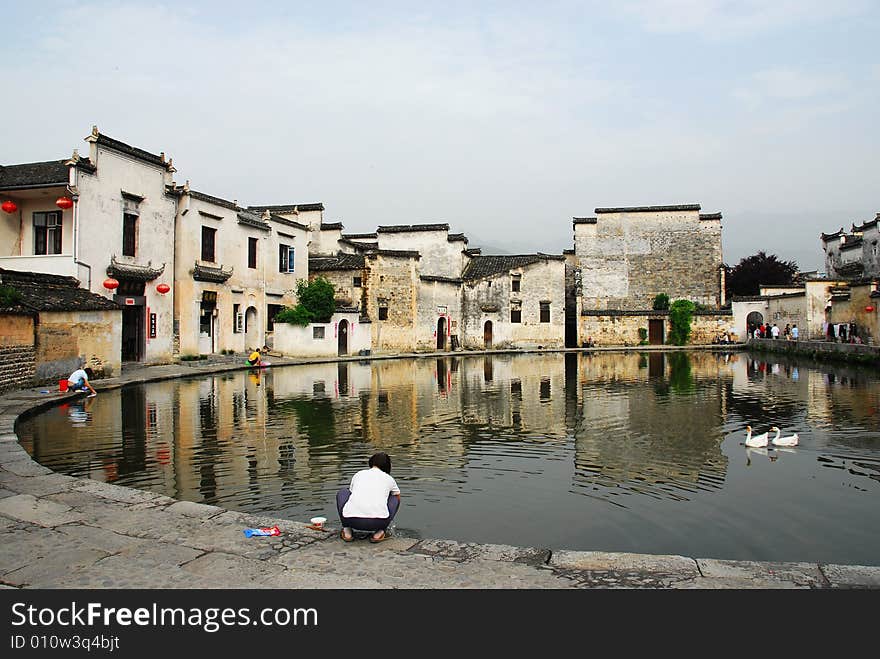 Hongcun, the world culture heritage of Anhui old villages of China, the tradition of Anhui civil houses are black tiles plus white brick walls. Nice comparison. Yue Zhao (moon lake) is in the middle of the village. Hongcun, the world culture heritage of Anhui old villages of China, the tradition of Anhui civil houses are black tiles plus white brick walls. Nice comparison. Yue Zhao (moon lake) is in the middle of the village.