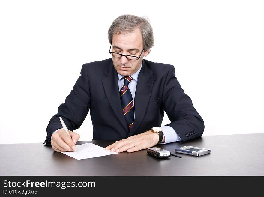 Mature businessman working, isolated over white background