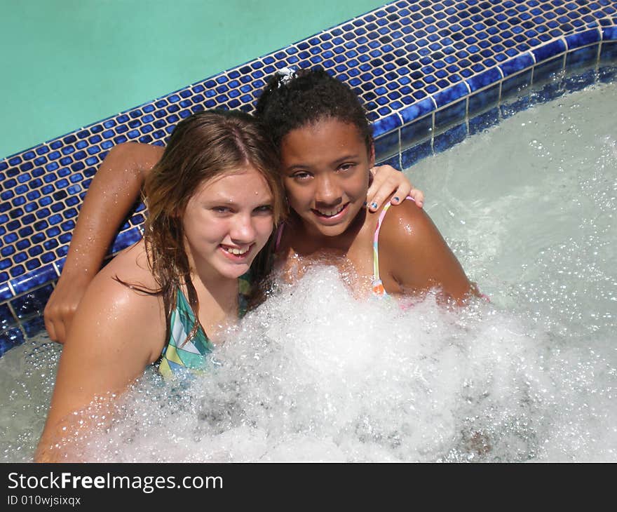 A picture of two girls who are best friends in a jacuzzi. A picture of two girls who are best friends in a jacuzzi.