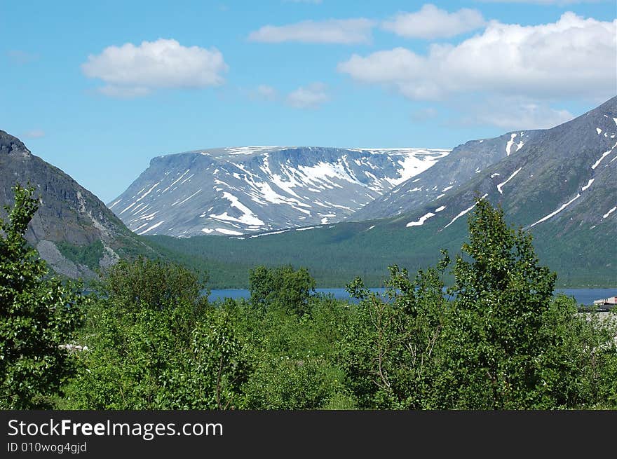 Beautiful lake in the mountains. Russian north.