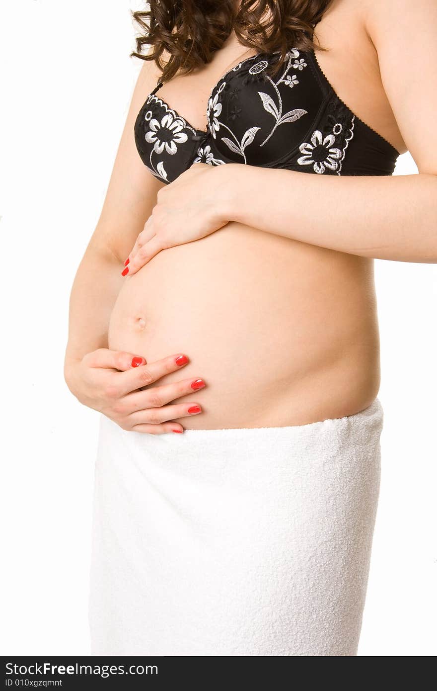 Pregnant woman holding her  belly