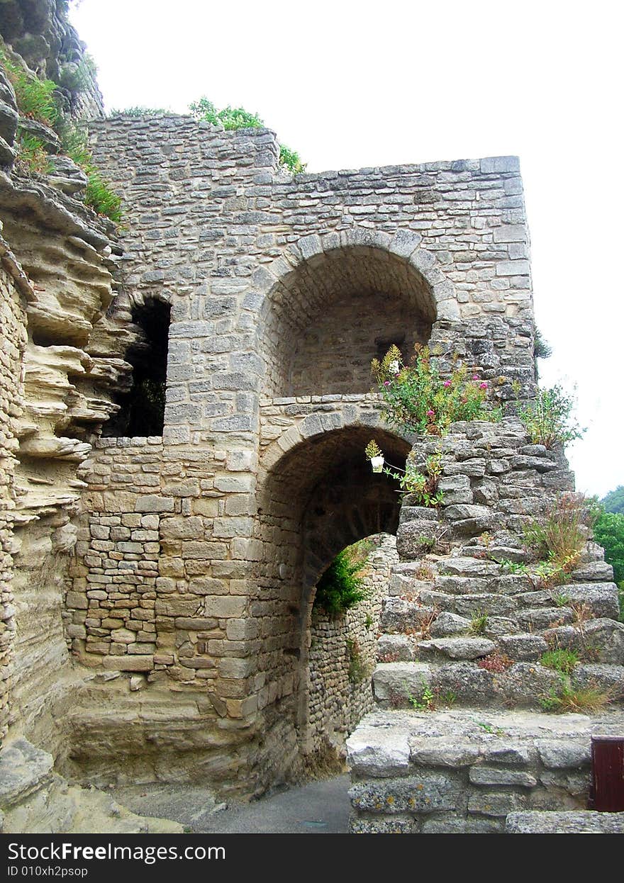 Old and narrow alley in a mediterranean village - Provence - France. Old and narrow alley in a mediterranean village - Provence - France