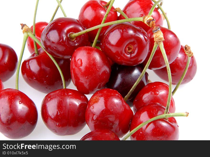 Delicious sweet cherry fruit on white background