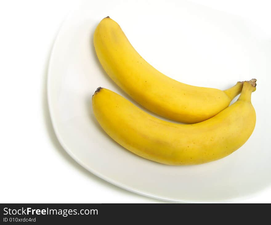 Bunch of bananas on plate