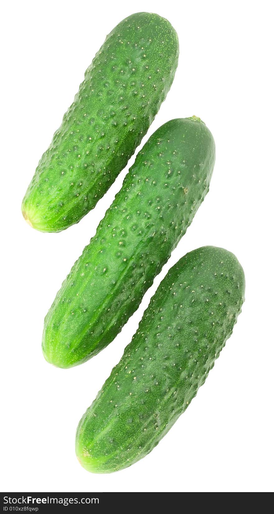 Nice fresh green cucumbers isolated over white