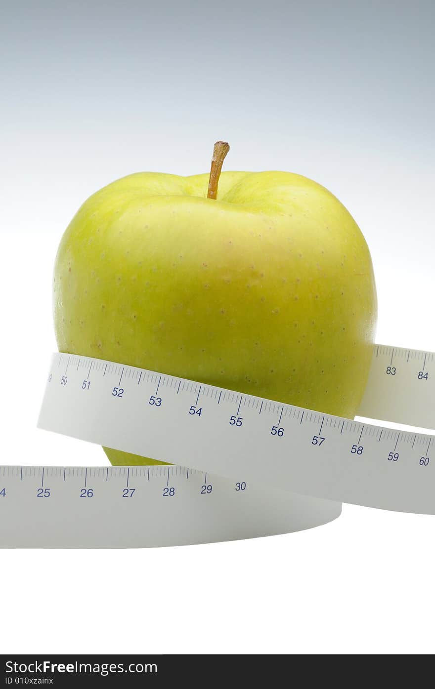 Green Apple With Measure Tape