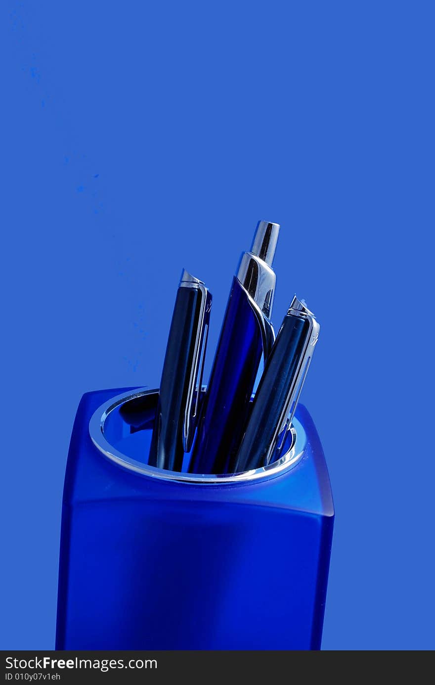 Pens in Blue Container