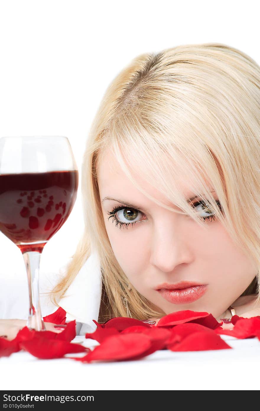 Cute blonde with wine and petals. Cute blonde with wine and petals