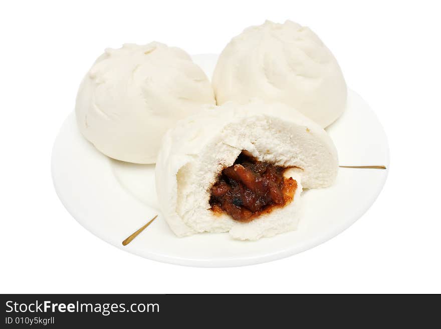 Two and half white Chinese barbecued pork bun (Cha Siu Baau) isolated on white background.