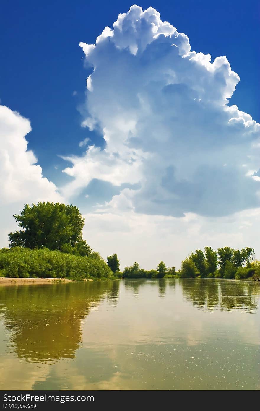 A Cloud Against A Backdrop Of Blue Sky. Landscape