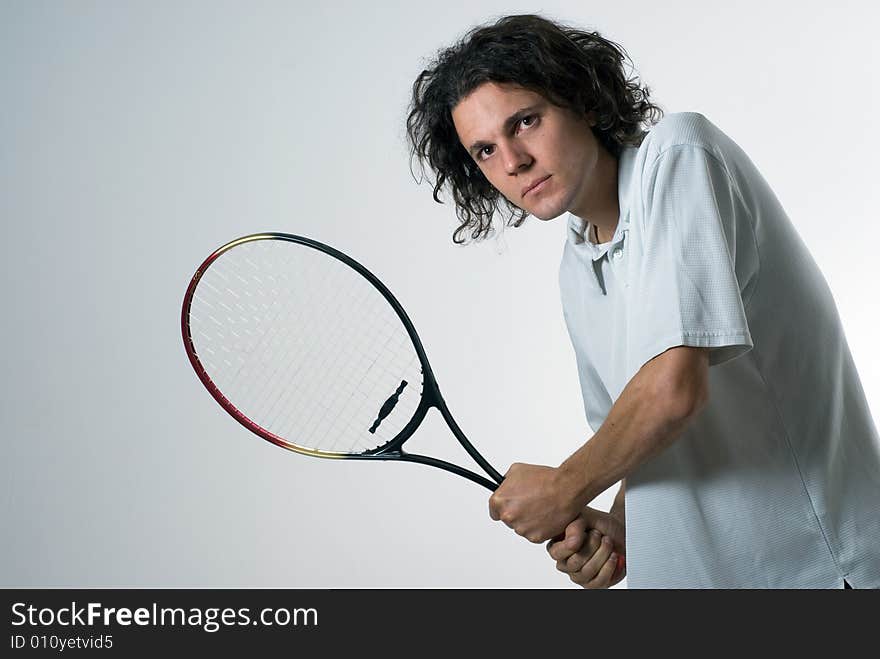 Man Holding Tennis Racket - horizontal