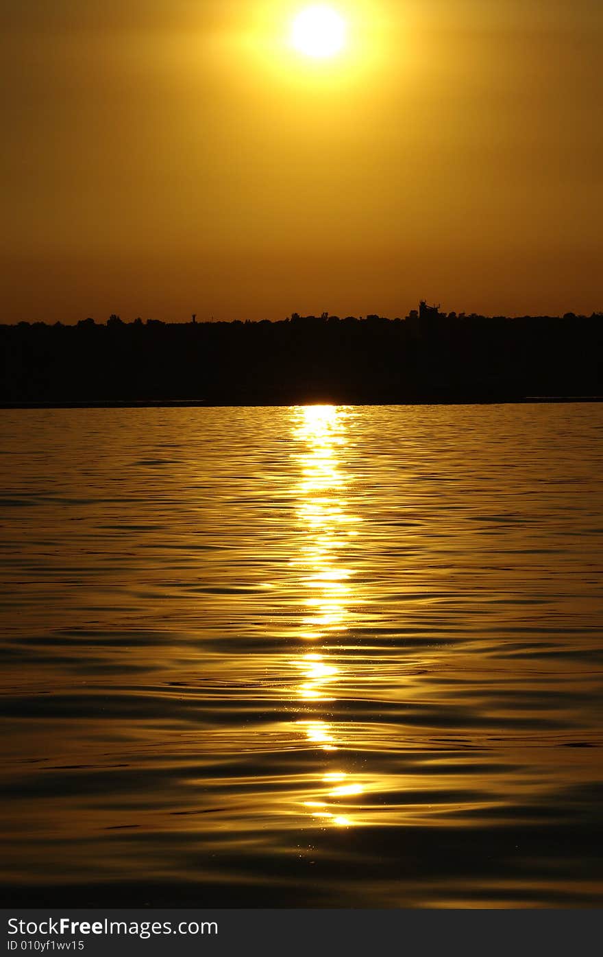 Reflection of sunset on the beach