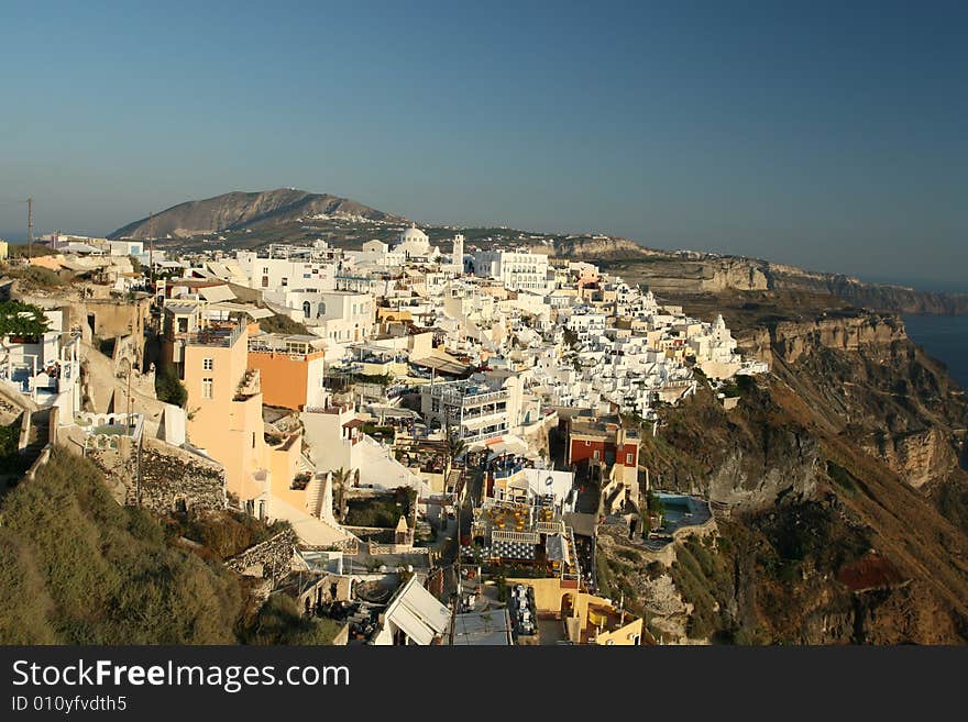 The famous hilltop village of Fira in Santorini, Greece. The famous hilltop village of Fira in Santorini, Greece.