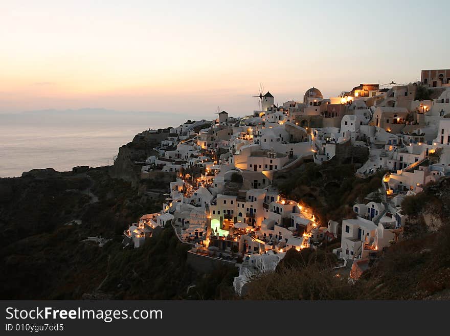 Views of stunning village overlooking Mediterranean sea at sunset. Views of stunning village overlooking Mediterranean sea at sunset.