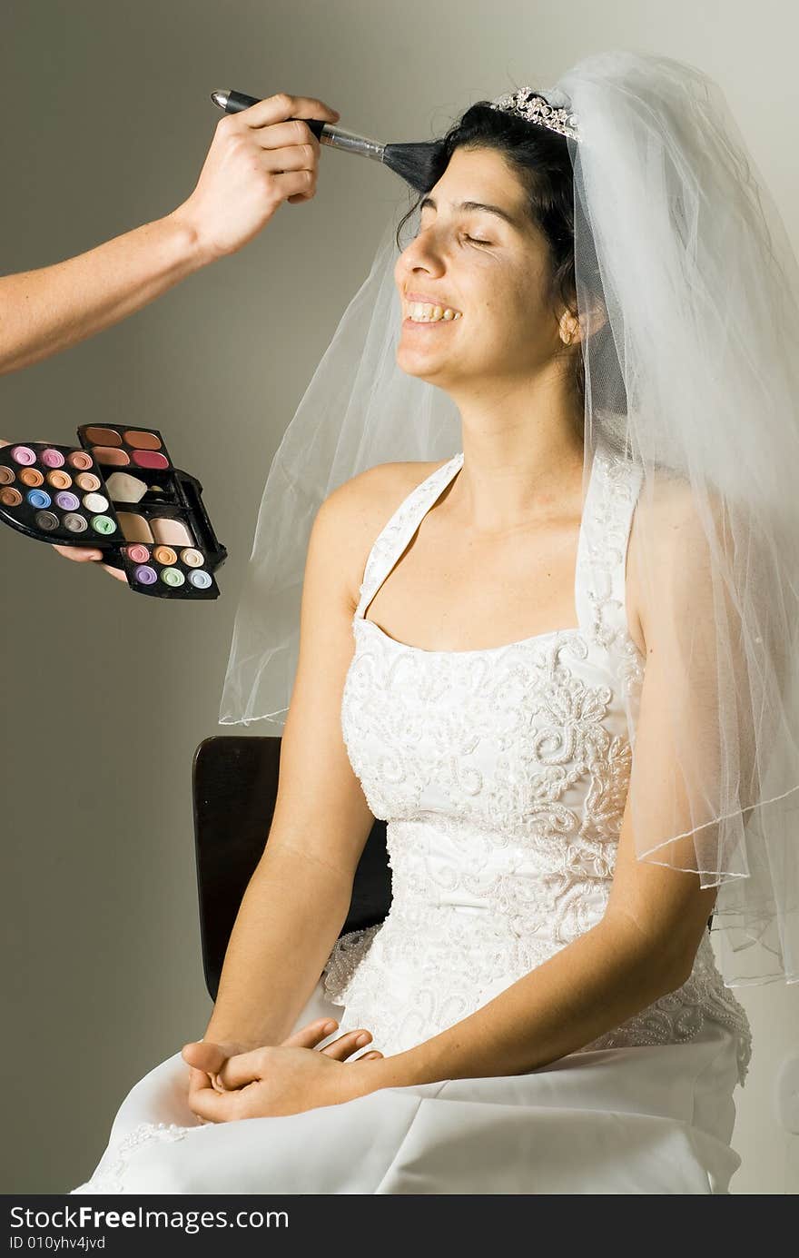 Soon-to-be Wife Getting Make-up Done - vertical