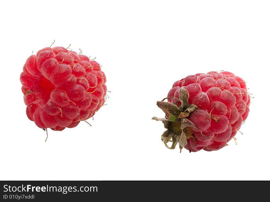 Fruits of a ripe raspberry on a white background