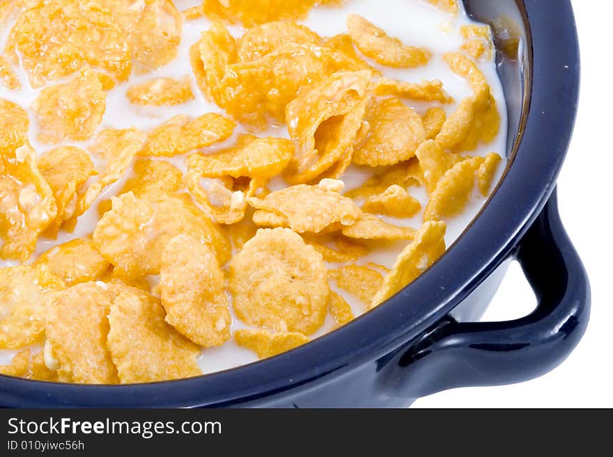 A bowl of cornflakes with milk - healthy diet