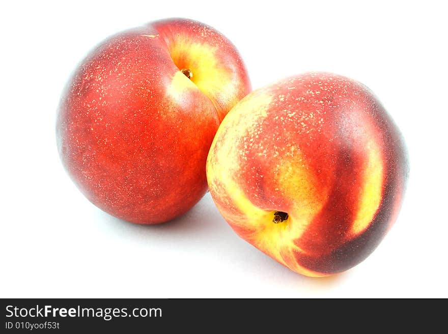 Isolated photo of two big fresh nectarines