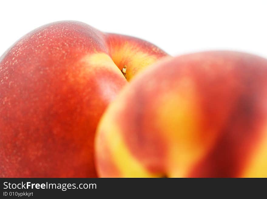 Isolated photo of two big fresh nectarines