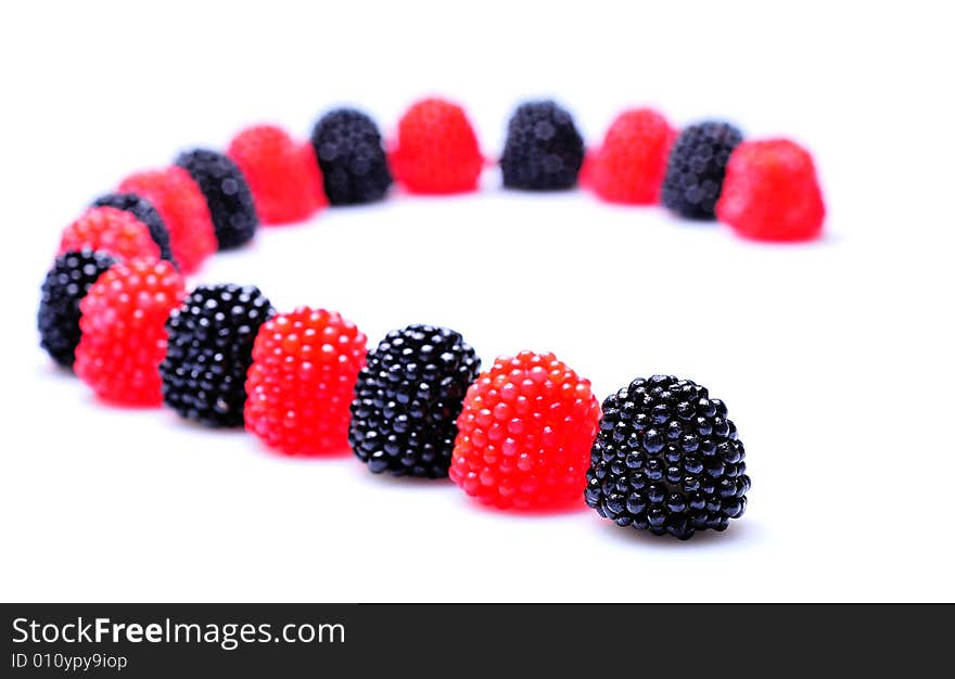 Closeup of colored candy on white background