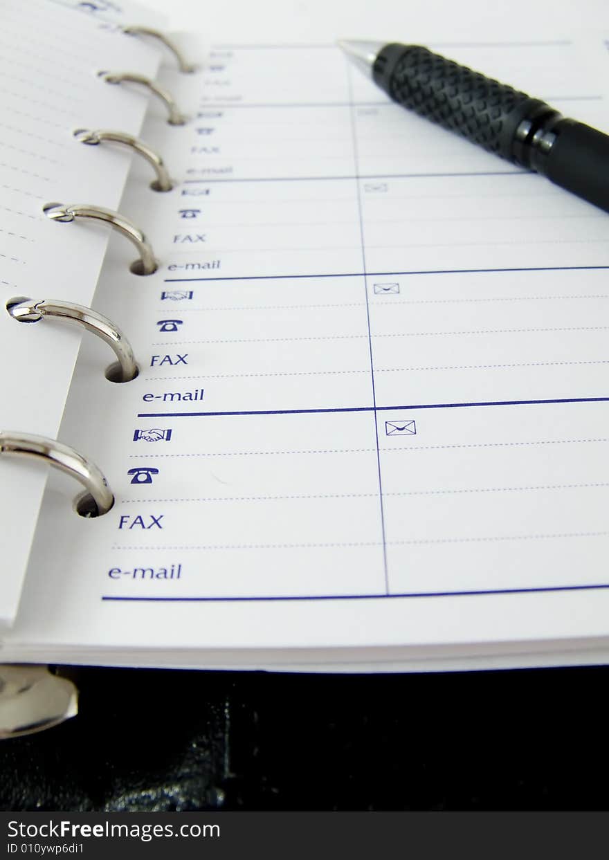 Open blank notebook on a white background whis pen. Open blank notebook on a white background whis pen