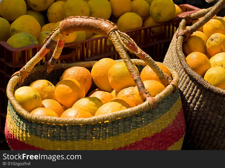 Baskets of oranges on farmers market