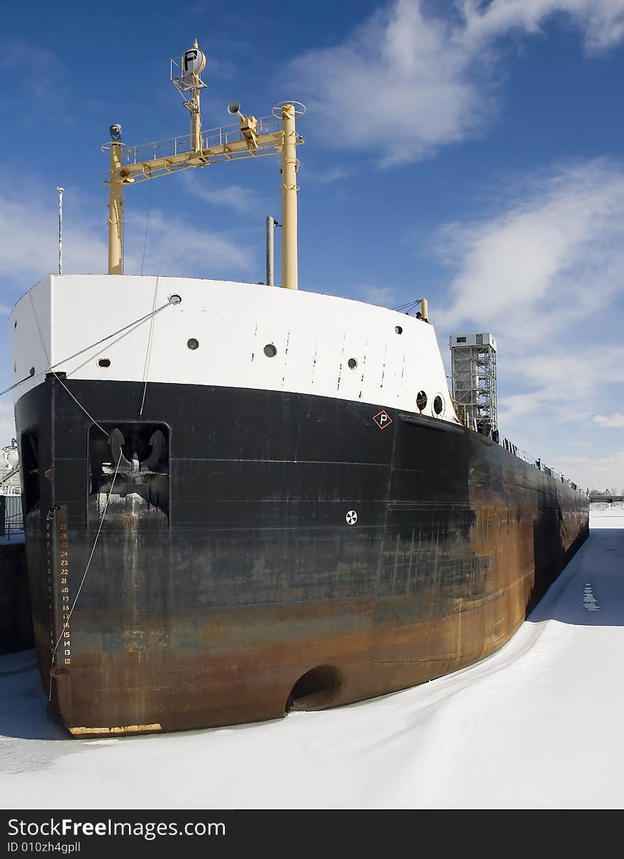 A big cargo ship docked at a port