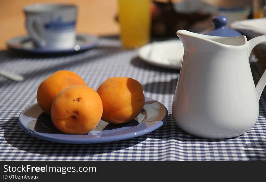 Breakfast table on sunny terrace, French Riviera