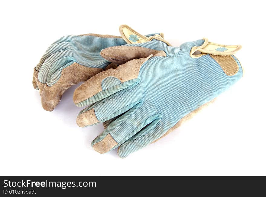 A photograph of work gloves against a white background