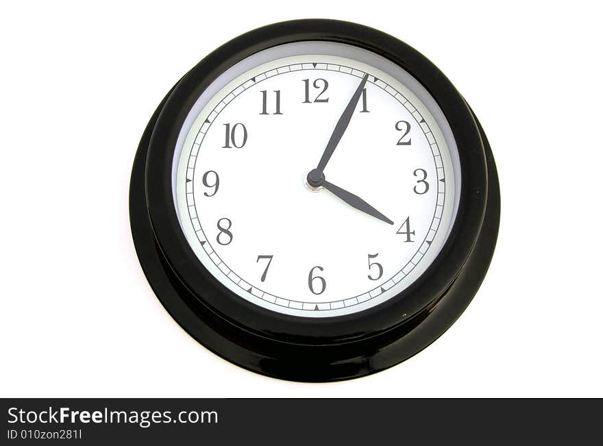 A photograph of a clock against a white background