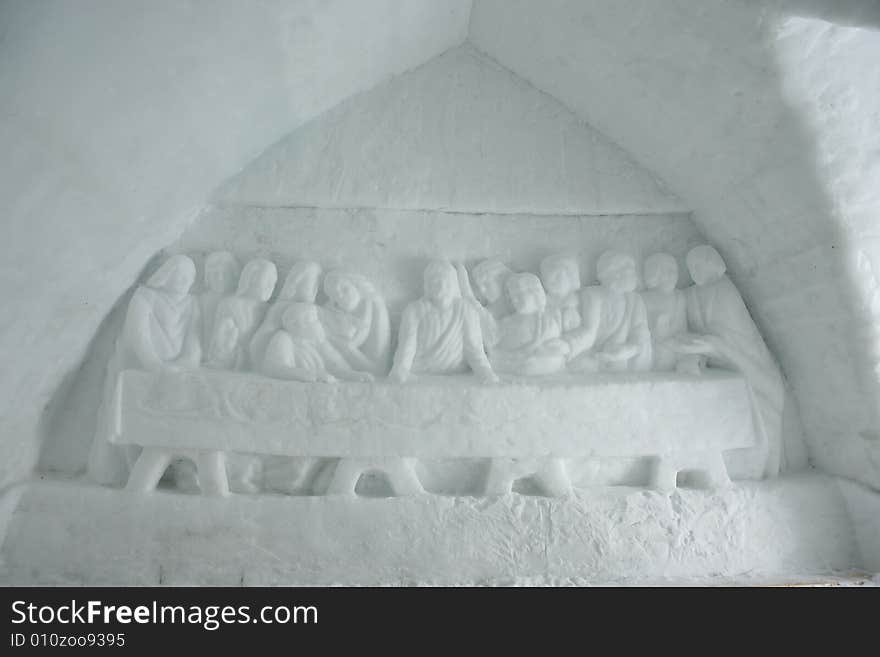 Jesus sculpted in ice in an ice church at Balea Lake, Fagarasi Mountains, Romania.  The Last Supper. Jesus sculpted in ice in an ice church at Balea Lake, Fagarasi Mountains, Romania.  The Last Supper