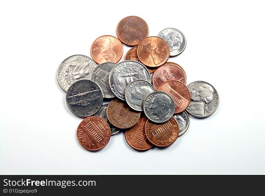 A photograph of a group of coins against a white background