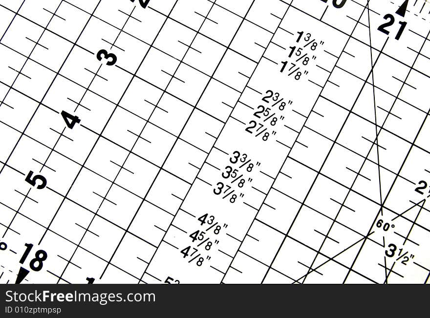 A photograph of a measuring square against a white background