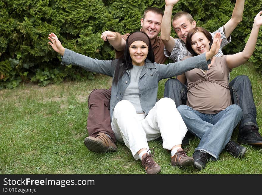 Friends together relaxing on grass. Friends together relaxing on grass