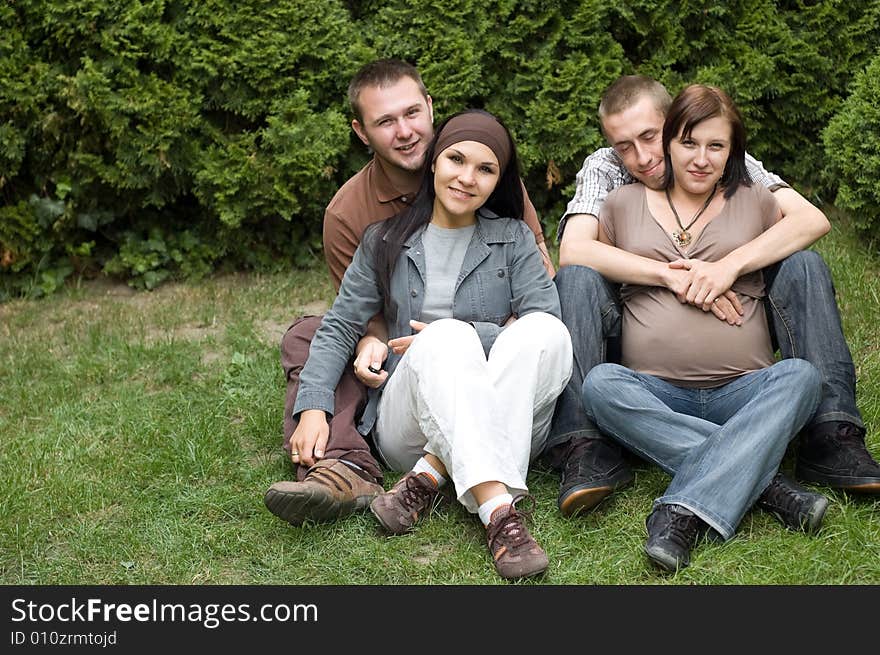 Friends together relaxing on grass. Friends together relaxing on grass