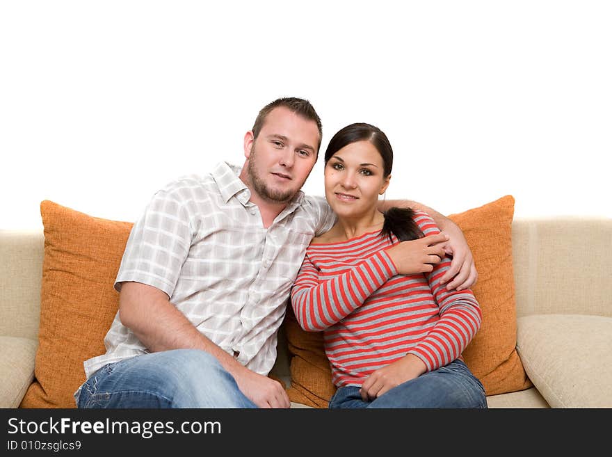 Happy family sitting on sofa. Happy family sitting on sofa