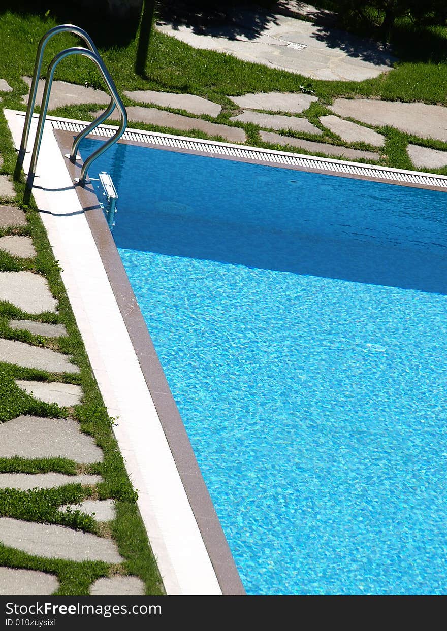 Shot of the little ladder of a pool