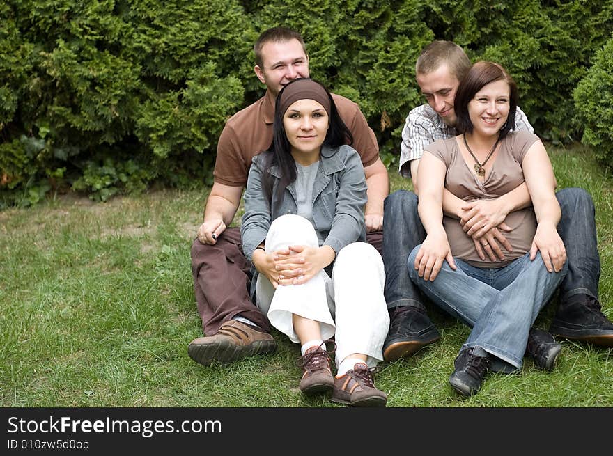 Friends together relaxing on grass. Friends together relaxing on grass