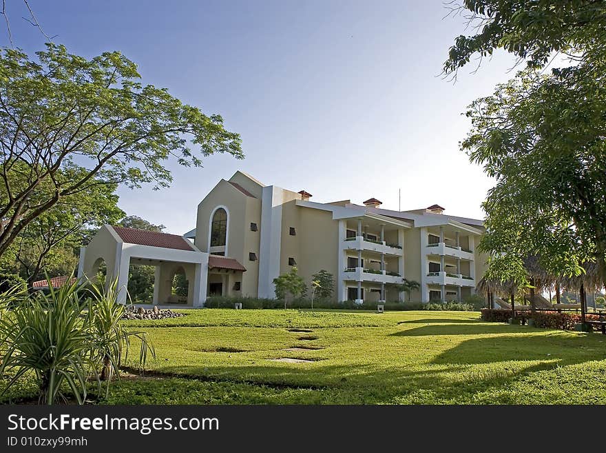 A luxury resort hotel on landscaped grounds. A luxury resort hotel on landscaped grounds