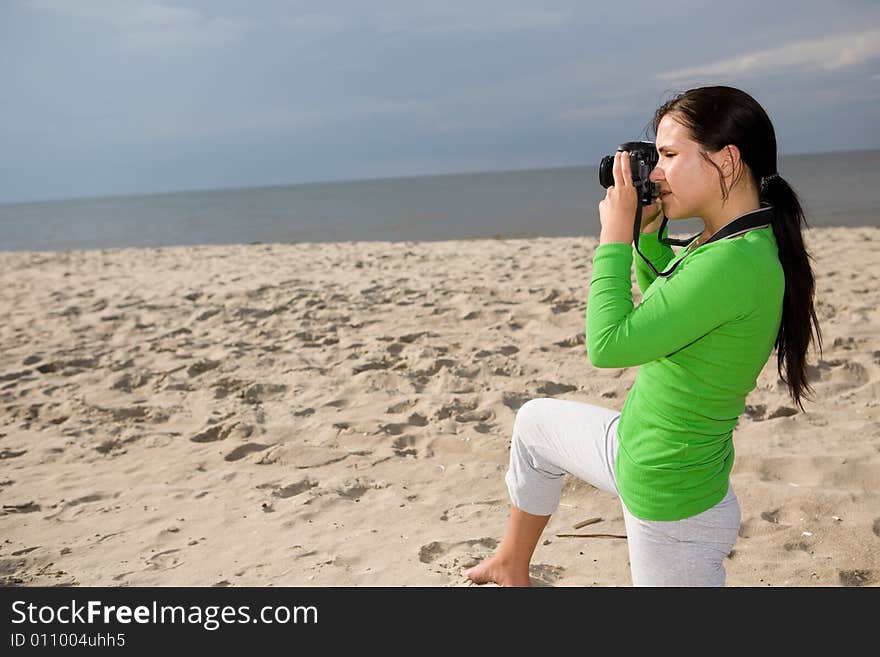 Attractive brunette woman on the beach. Attractive brunette woman on the beach