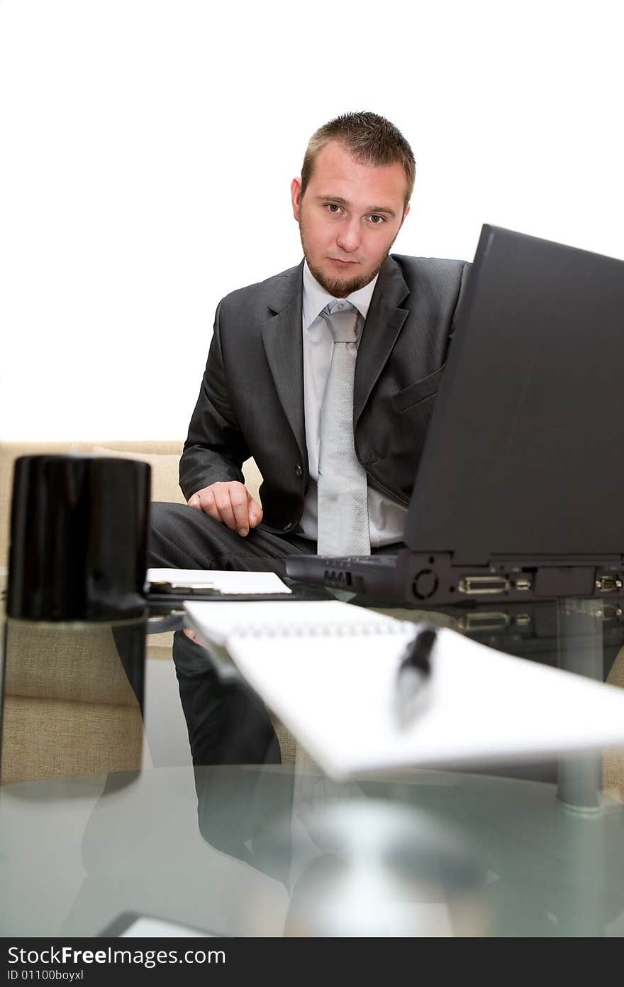 Happy man sitting on sofa with laptop. Happy man sitting on sofa with laptop