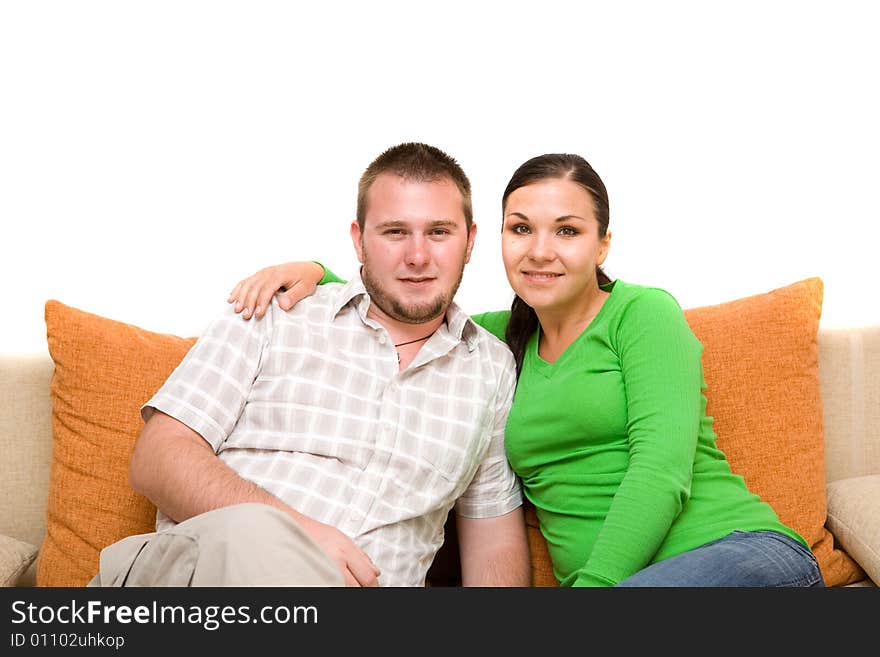 Happy family sitting on sofa. Happy family sitting on sofa